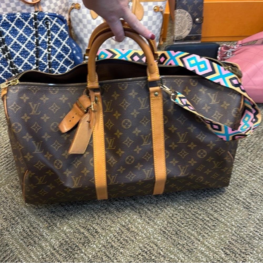 Beautiful Louis Vuitton duffle. Perfect for traveling. Carry on size.
